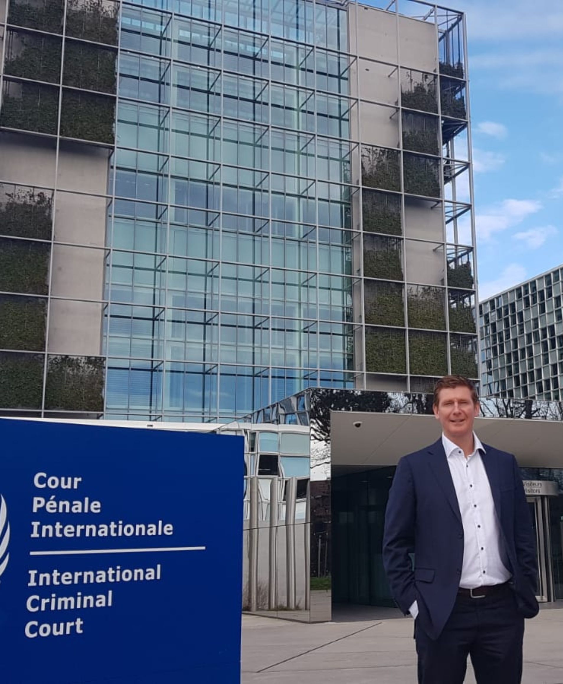 Brendan in front of International Criminal Court